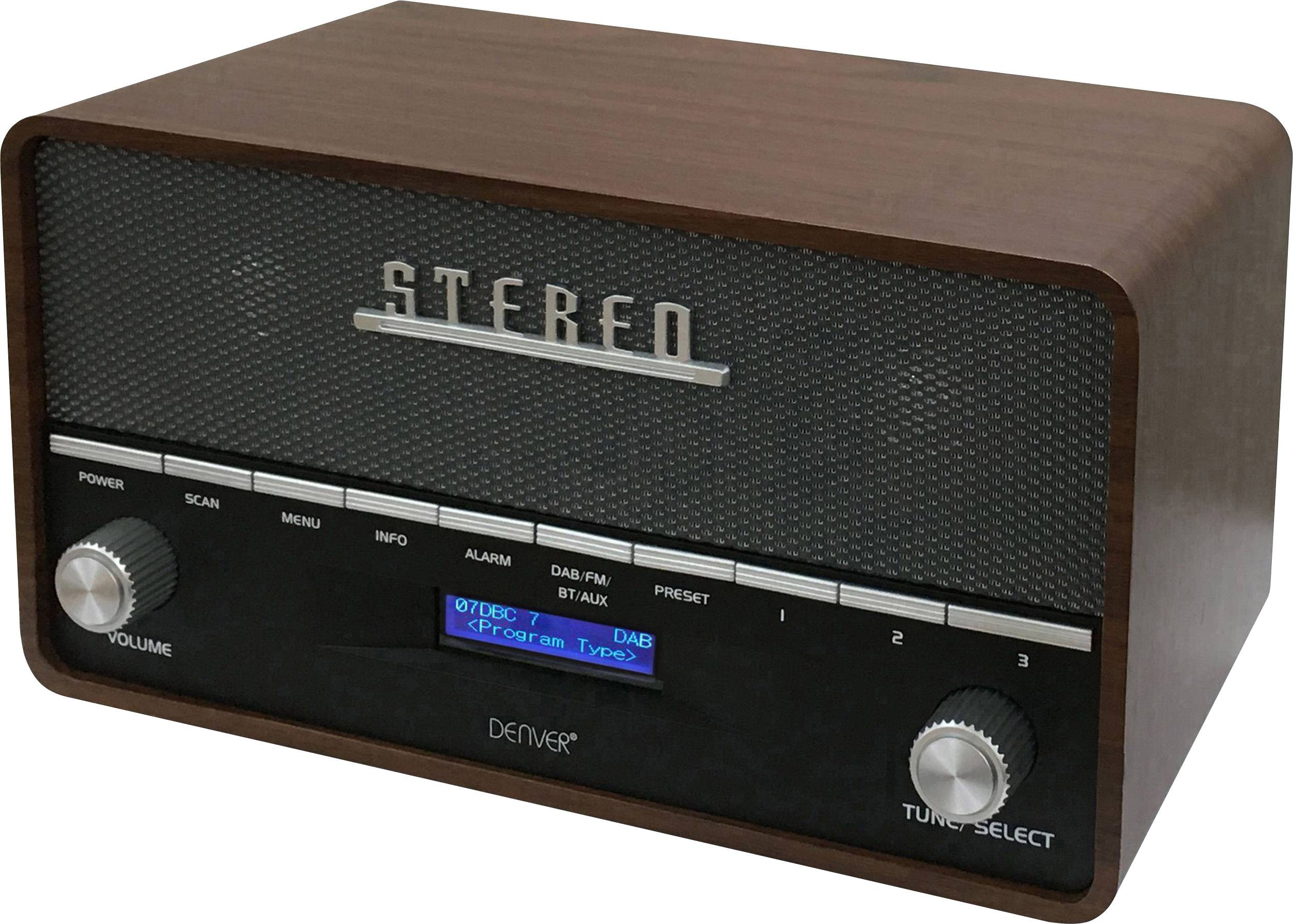 Retro radio u dizajnu drva s digitalnim upravljačkim elementima prikazuje 'Stereo' na prednjoj strani te ima tipke za glasnoću i odabir postaje.