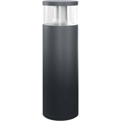 Moderna crna stolna lampa cilindričnog oblika s prozirnim gornjim staklenim dijelom koji jednoliko raspršuje svjetlost.