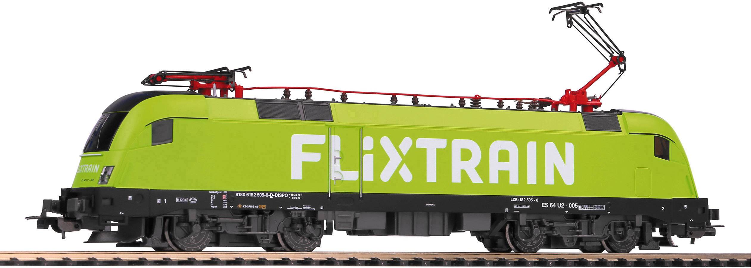 Zeleni Flixtrain vlak na tračnicama, pogled sa strane, vidljivi električni vodovi iznad, prepoznatljiv bijeli logotip na strani vlaka.