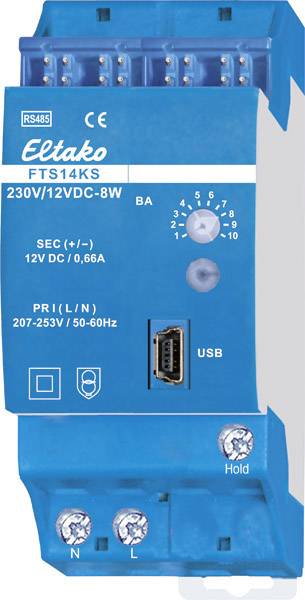 Električka naprava u plavoj boji, model 'Eltako FTS14KS', s priključcima, USB portom i podesivim okretnim prekidačem za različite postavke.