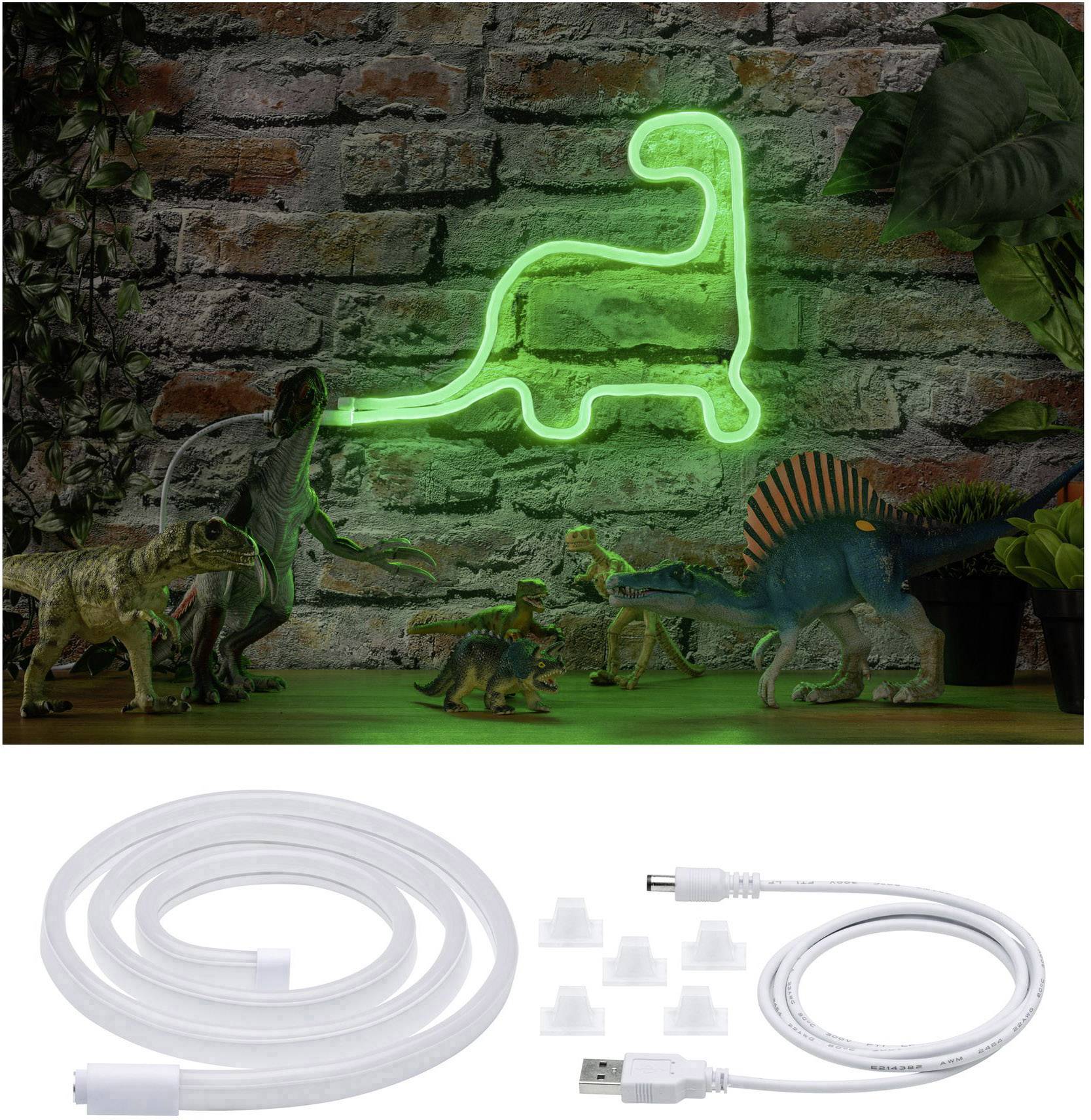 Zeleni neonski dinosaurus na opečnom zidu, okružen figurama dinosaura. Ispod se nalazi USB kabel s priborom.