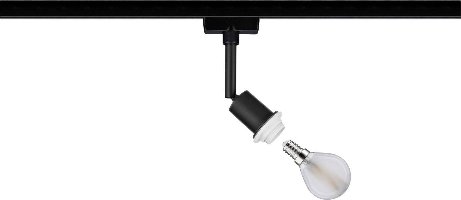 Žarulja pada iz crnog postoljca lampe prema podu.