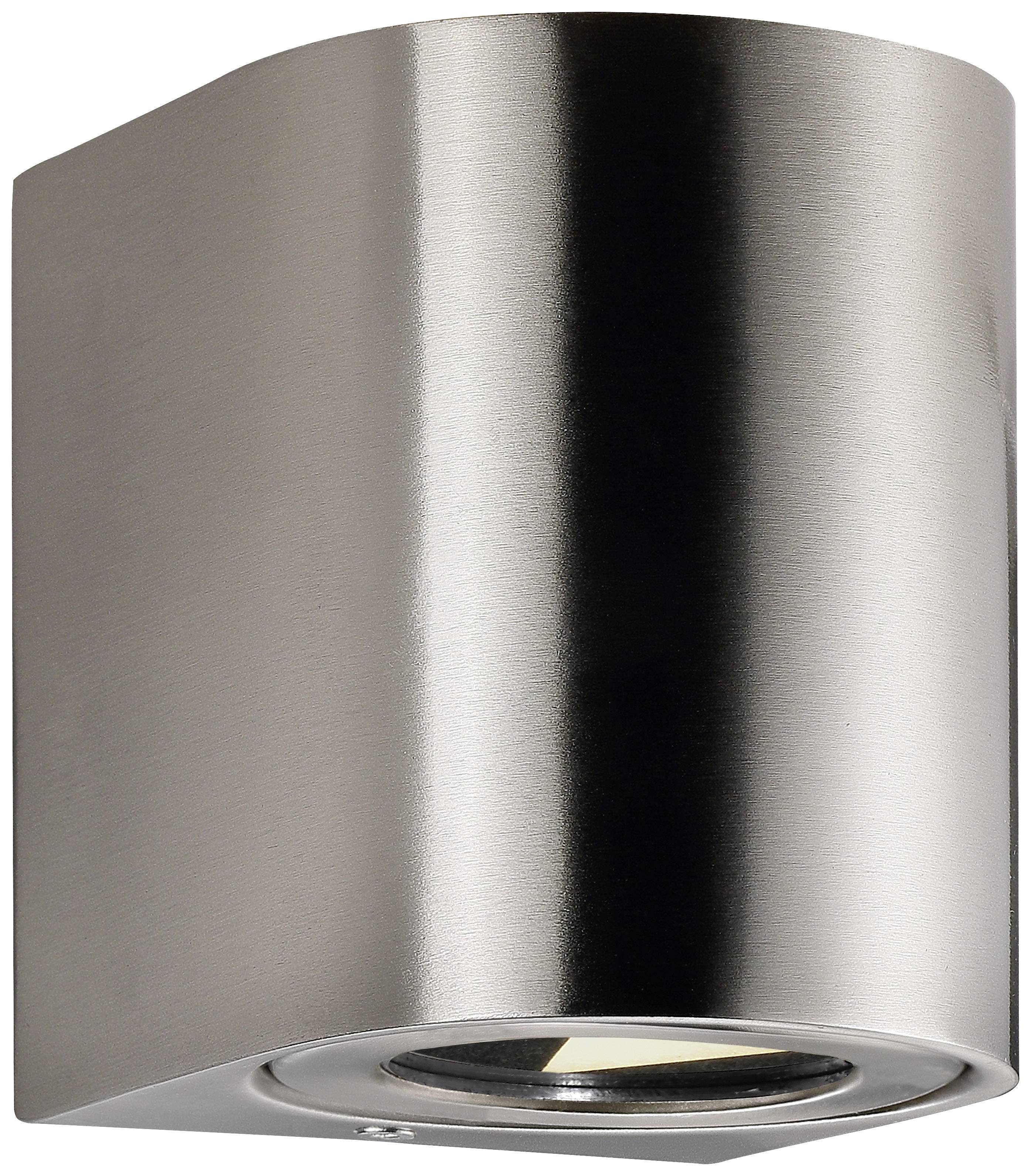 Moderna cilindrična zidna lampa od brušenog metala s usmjerenim snopom svjetlosti prema dolje.
