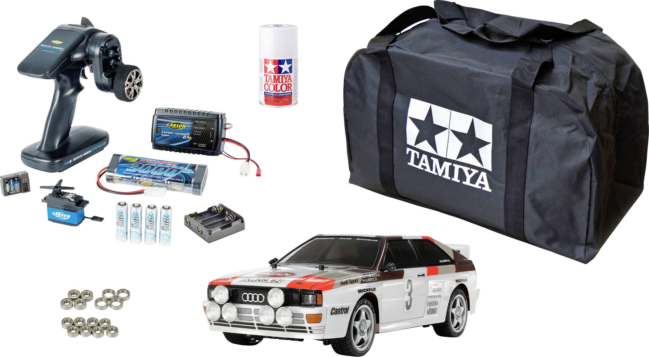 RC model automobila postavljeni set s Audi Sport dizajnom, daljinskim upravljačem, baterijama, punjačem, sprejem za bojanje i torbu za prenošenje s Tamiya logotipom.