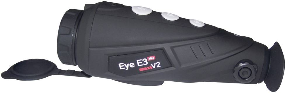 Ručni uređaj s poklopcem leće, oznake 'Eye E3 MAX V2', četiri bijele tipke gore, vjerojatno optički uređaj ili uređaj za noćni vid.