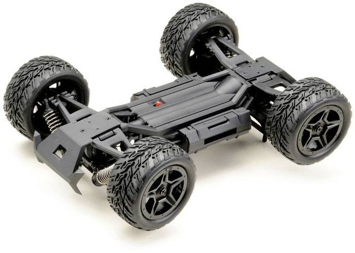 Crno RC auto šasije bez karoserije, prikazuje ovjes i velike gume. Pogodno za vožnje izvan asfaltnih cesta.