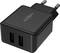 Crni USB punjač s dva USB priključka i europskim utikačem, pogodan za punjenje elektroničkih uređaja.