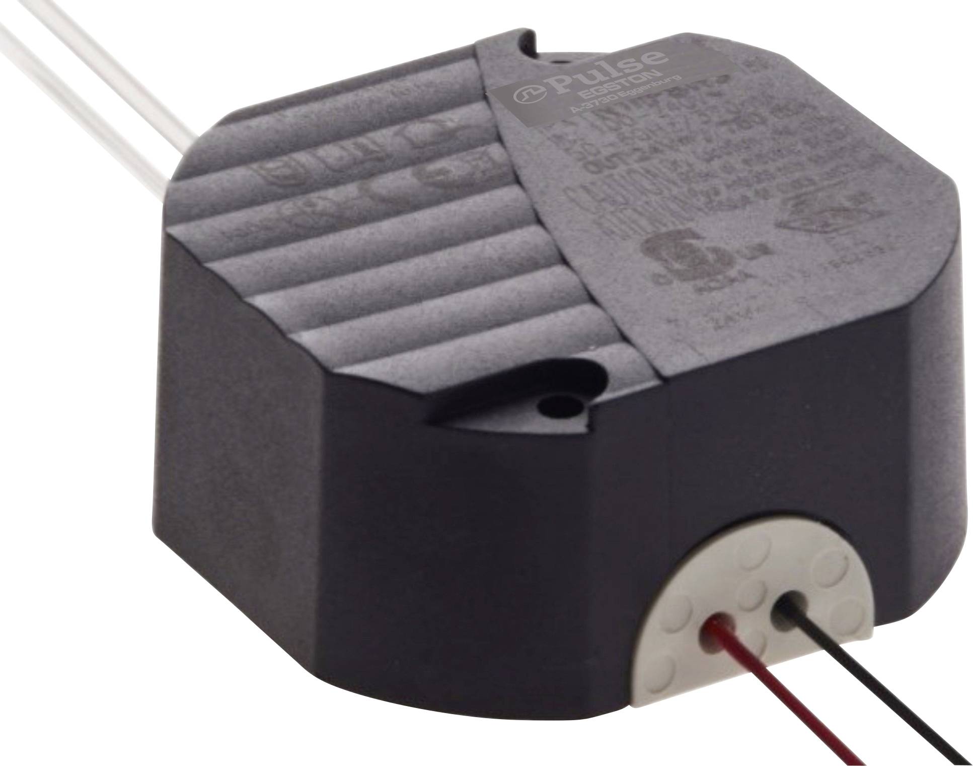 Crni elektronički transformator, šesterokutnog oblika, s kabelskim priključcima na jednoj strani.