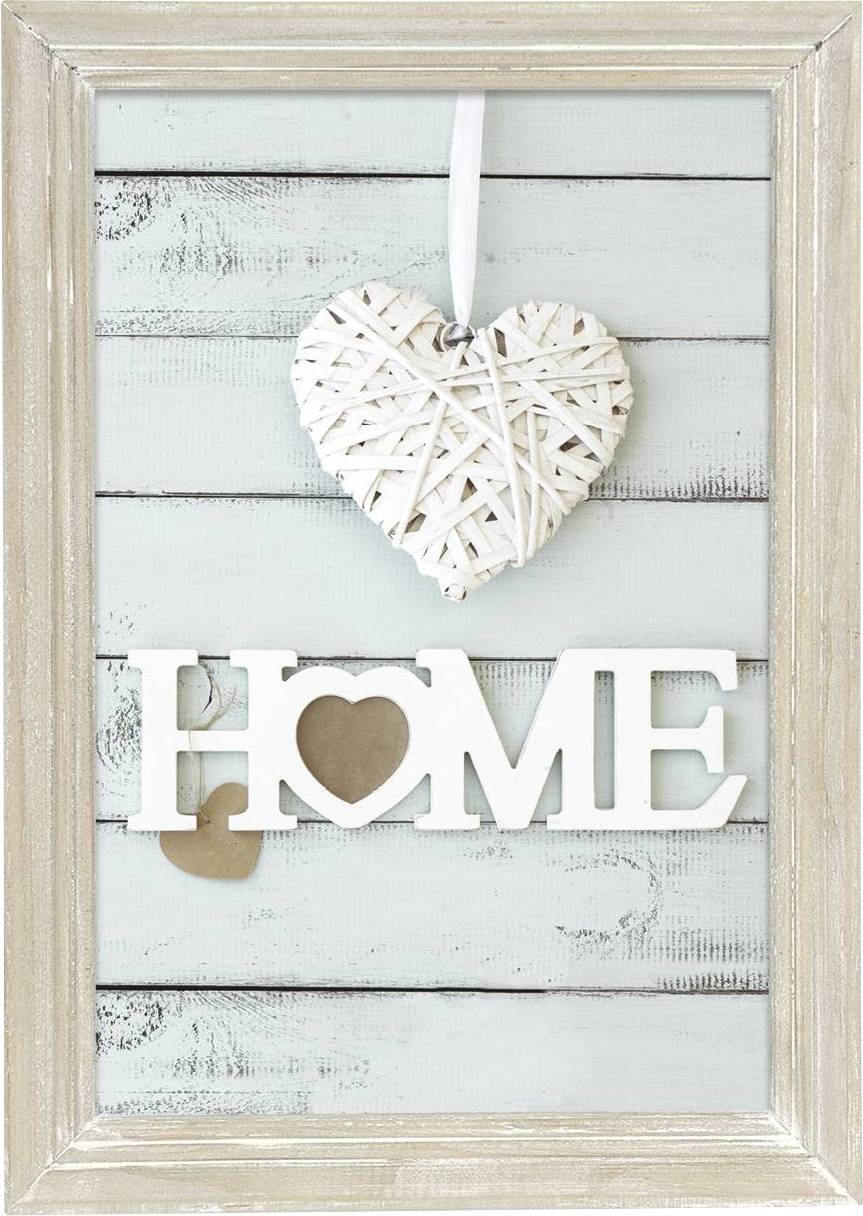 Uokvirjena slika s ornamentom u obliku srca i riječju 'HOME' velikim bijelim slovima na pozadini drvenih dasaka.