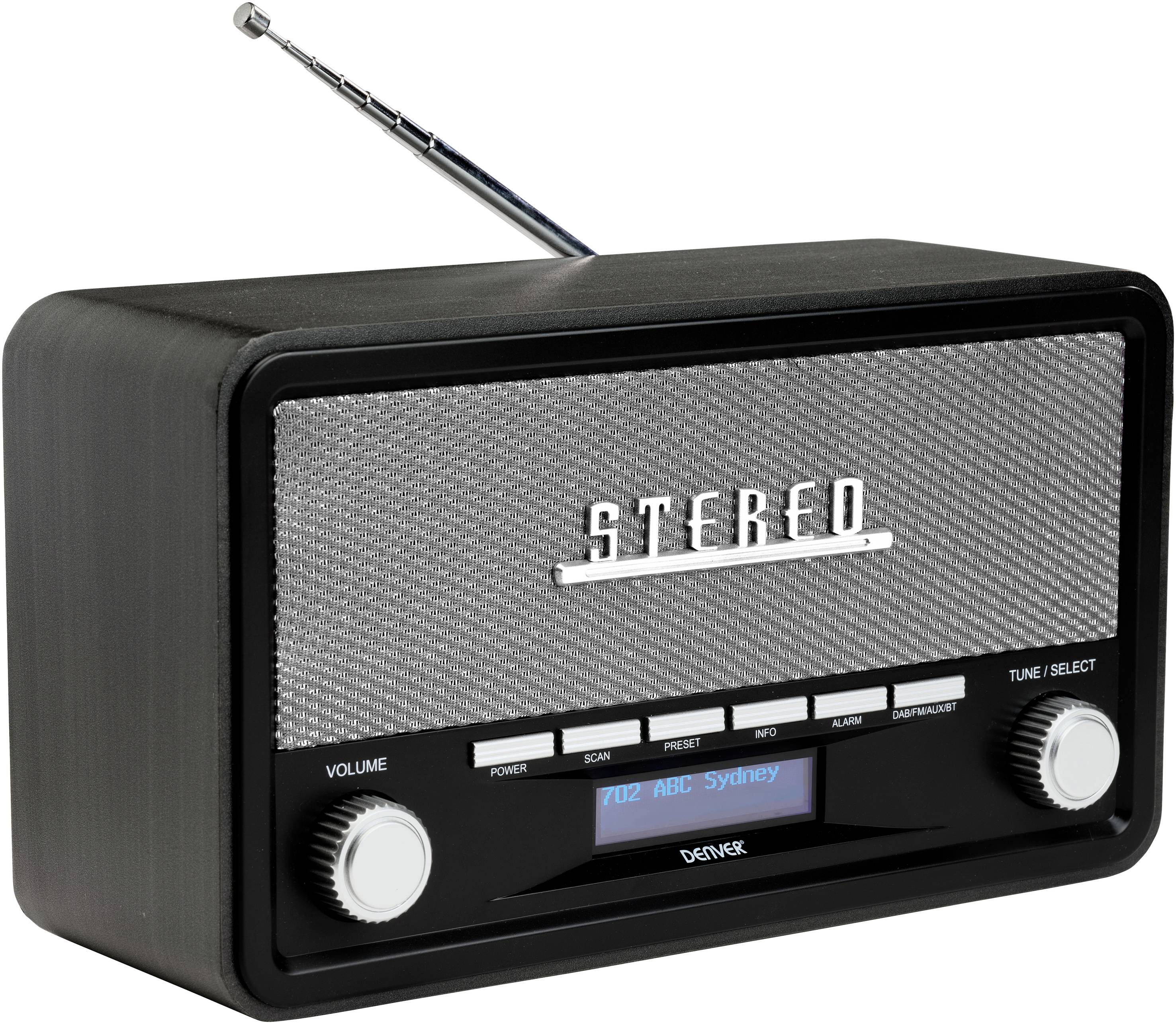Retro radio sive sive kućištem u sivoj boji, s dvije okrugle gumbe za glasnoću i odabir postaje, s vidljivom, izvučenom antenom.
