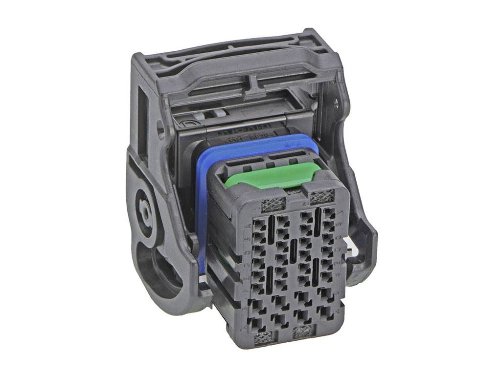 Crni plastični mrežni adapter s više obojenih umetaka, vjerojatno namijenjen elektroničkim ili električnim povezivanjima.