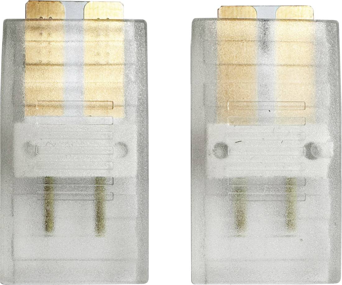Rentgenski snimak dva identična elektronička konektora ili utikača postavljena jedan pored drugoga, prikazujući unutarnje metalne polove i žičane veze kroz prozirna plastična kućišta.