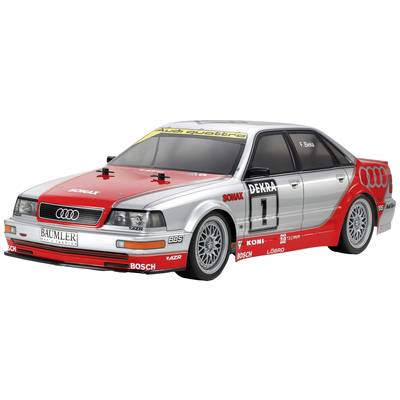 Crveni i srebrnosivi Audi model trkaćeg automobila sa sponzorskim naljepnicama i startnim brojem '1'.