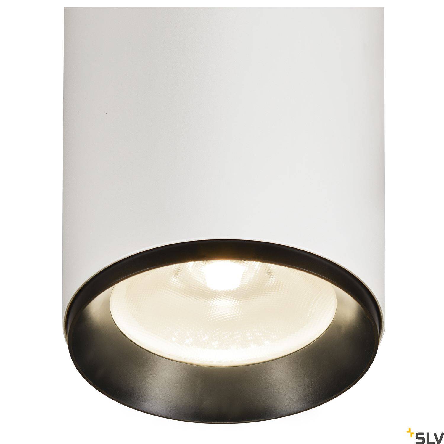 Cilindrična stropna lampa s bijelim kućištem i crnim rubom koja emitira topli svjetlosni prsten.