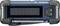 Plavi prijenosni radio prijemnik sa solarnom ćelijom i ručnom reostatskom kvakom. Prednja strana s tipkama za alarm i osvjetljenje. Idealan za aktivnosti na otvorenom.