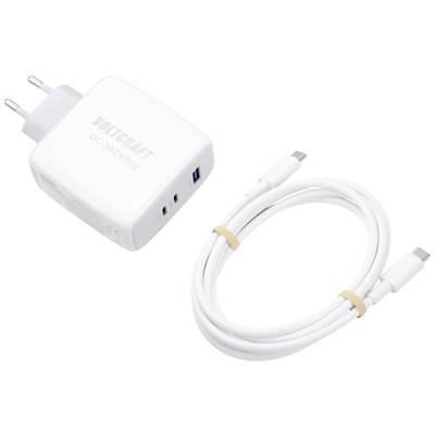 Bijeli punjač s dva USB priključka i europskom utičnicom, pokraj njega odgovarajući bijeli punjački kabel.