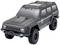 Crno igračka automobil u stilu terenskog vozila sa velikim gumama, srebrnim detaljima i natpisom sa strane 'REXY'.
