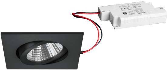 Elektronički transformator s kabelima, spojen na pojedinačni LED downlight na crnoj podlozi.