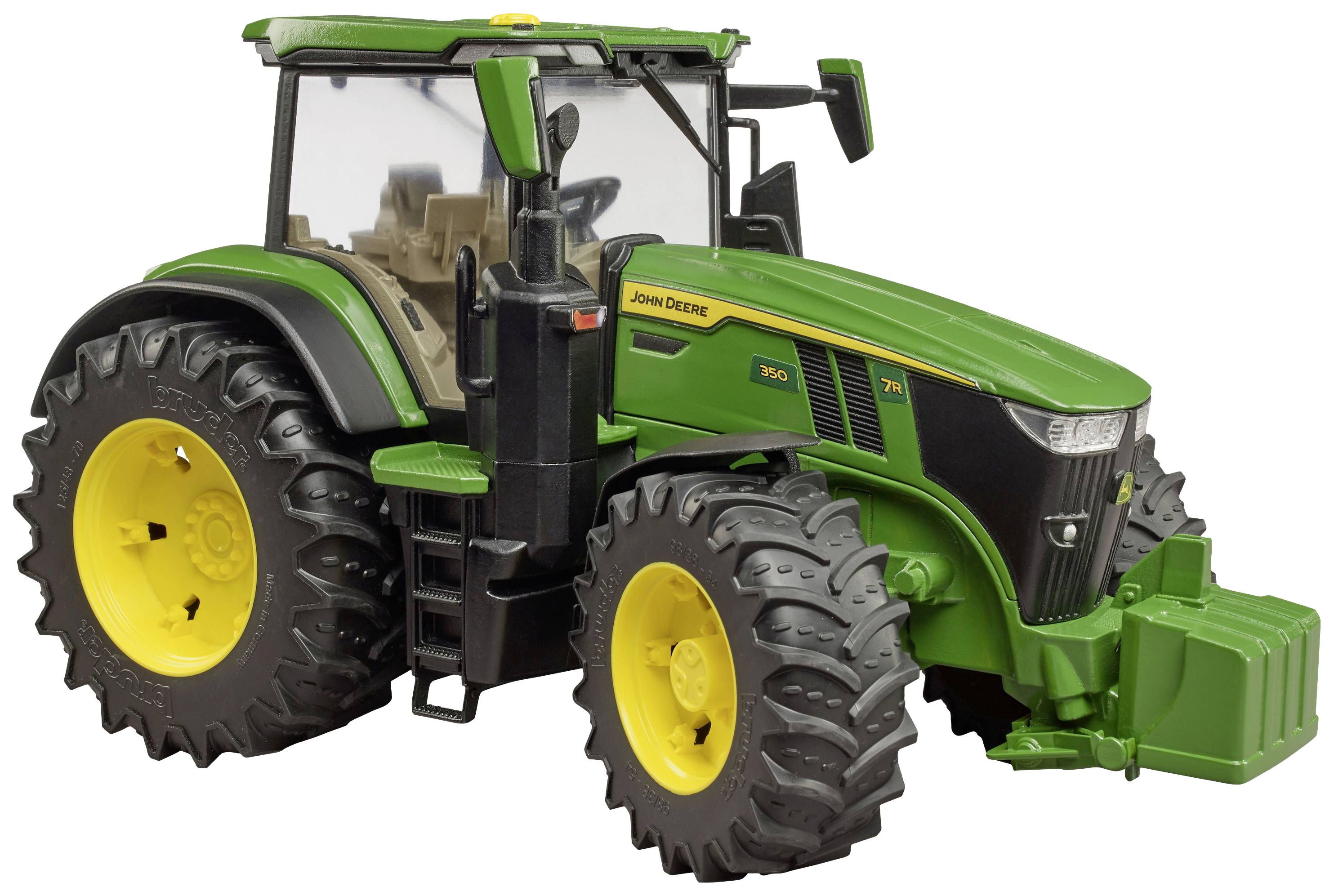 Zeleni traktor sa žutim kotačima i velikom vozačkom kabinom.