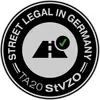 Na slici se nalazi okrugli znak 'Street Legal in Germany TA20 StVZO' s prometnim simbolom i zelenom kvačicom.