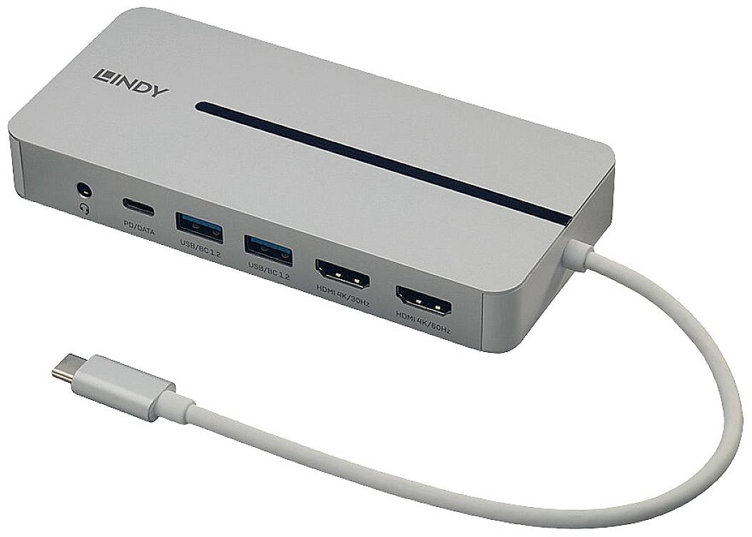 Srebrni USB-C hub s više priključaka: USB-C, dva USB 3.0 i dva HDMI. Povezuje različite uređaje s računalom.