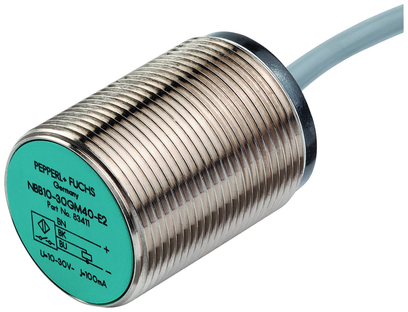 Cilindrični senzor tvrtke Pepperl+Fuchs s kabelskim priključkom. Senzor ima zeleni završni poklopac s tehničkim specifikacijama.