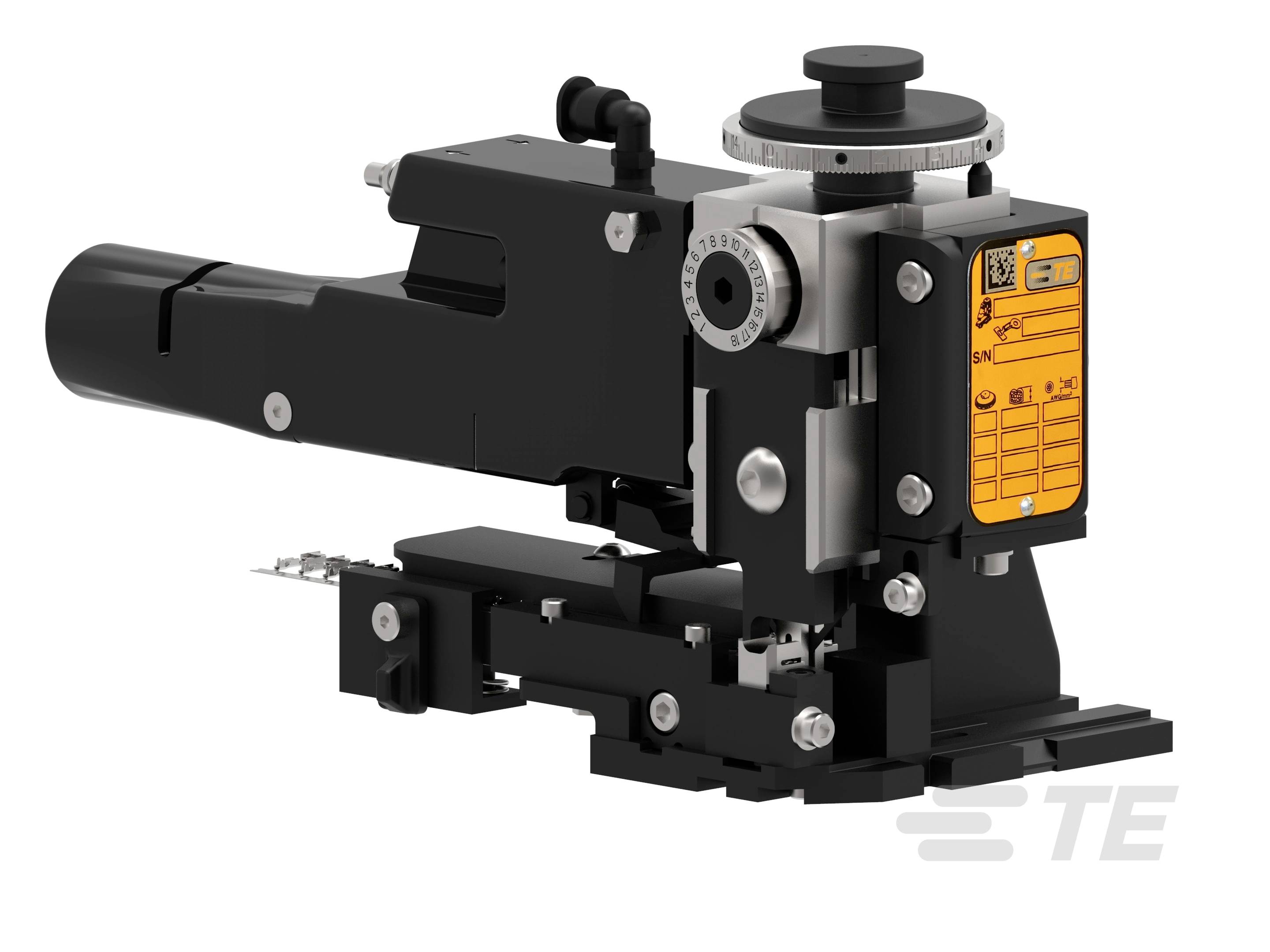 Crna, industrijska naprava s narančastom etiketom koja se koristi za obradu kabela. Etiketa sadrži tehničke specifikacije.