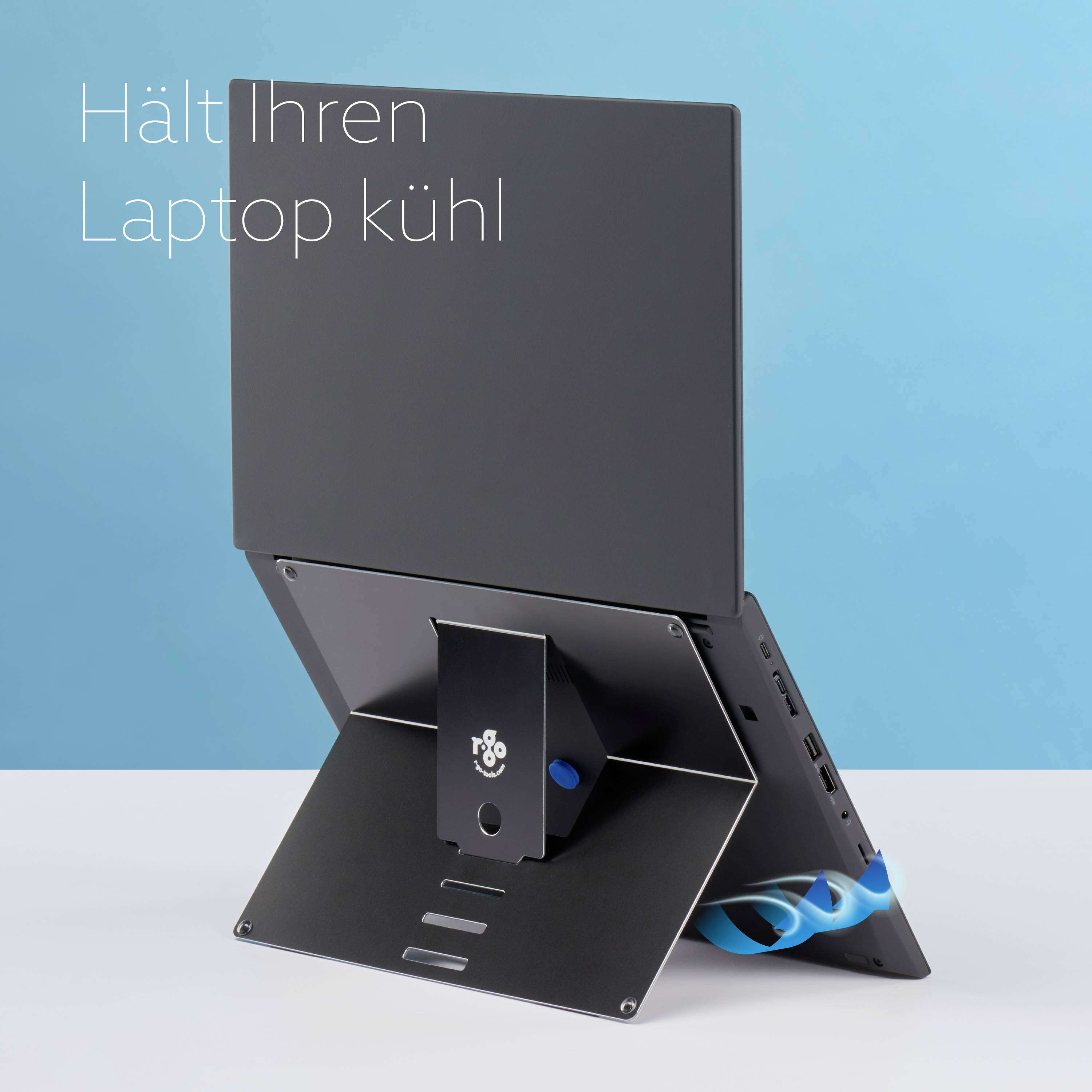 Laptop na stalku koji ga hladi, s tekstom 'Drži vaš laptop hladnim'.