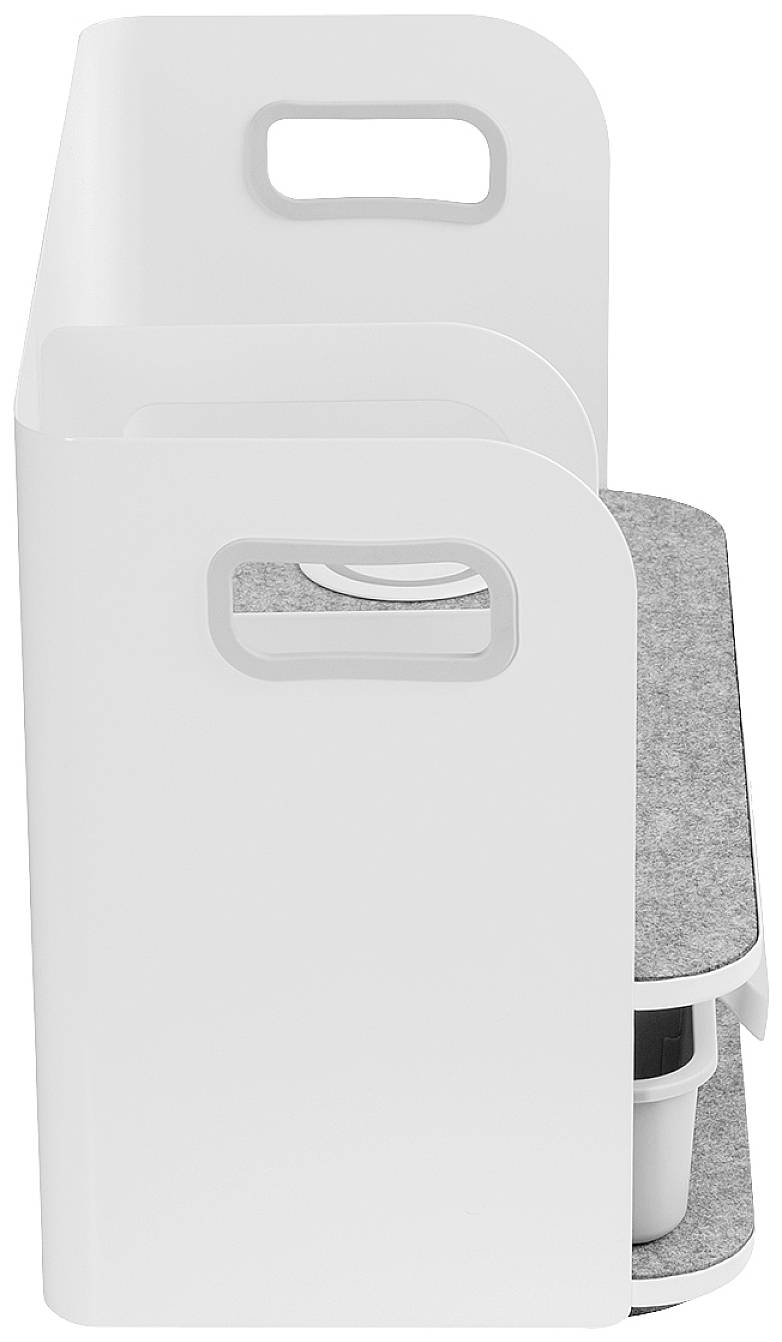 Bijela, moderna, uska polica s ručkom. Sadrži dva pretinca i sivu površinu na vrhu. Podesiva za uredski materijal ili pisma.