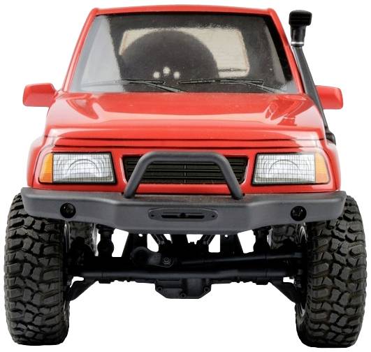 Crveni igračka automobil u stilu terenskog vozila, pogledan sprijeda, s velikim gumama i branicima.