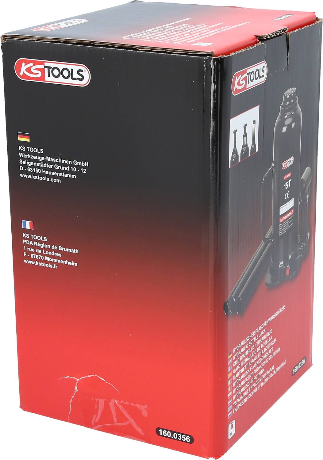 Crvena ambalaža dizalice marke KS TOOLS sa prikazom proizvoda i podacima o tvrtki na stranici.