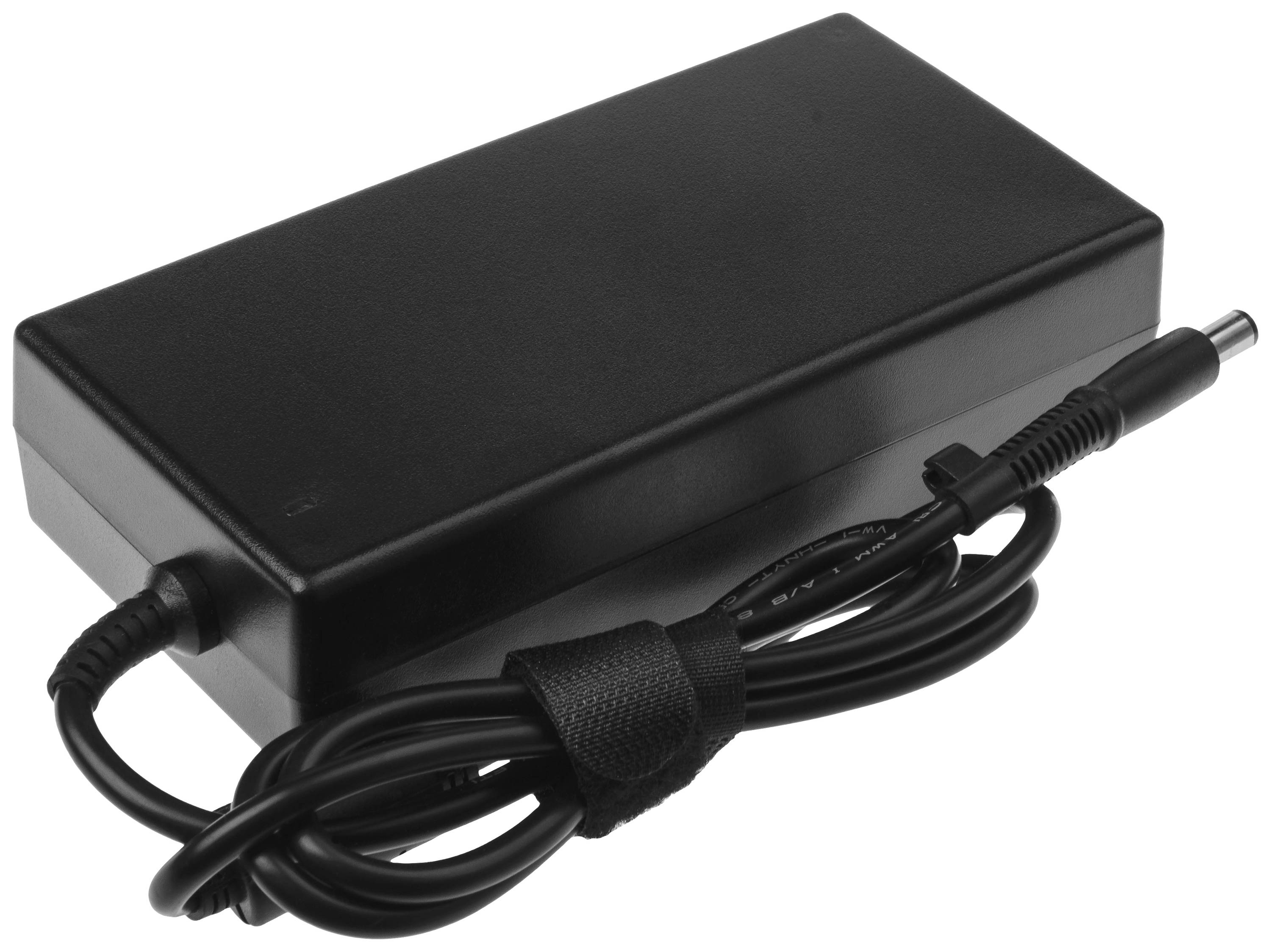 Crni mrežni adapter s kabelom, tipično korišten za prijenosna računala. Kabel je osiguran čičak trakom.