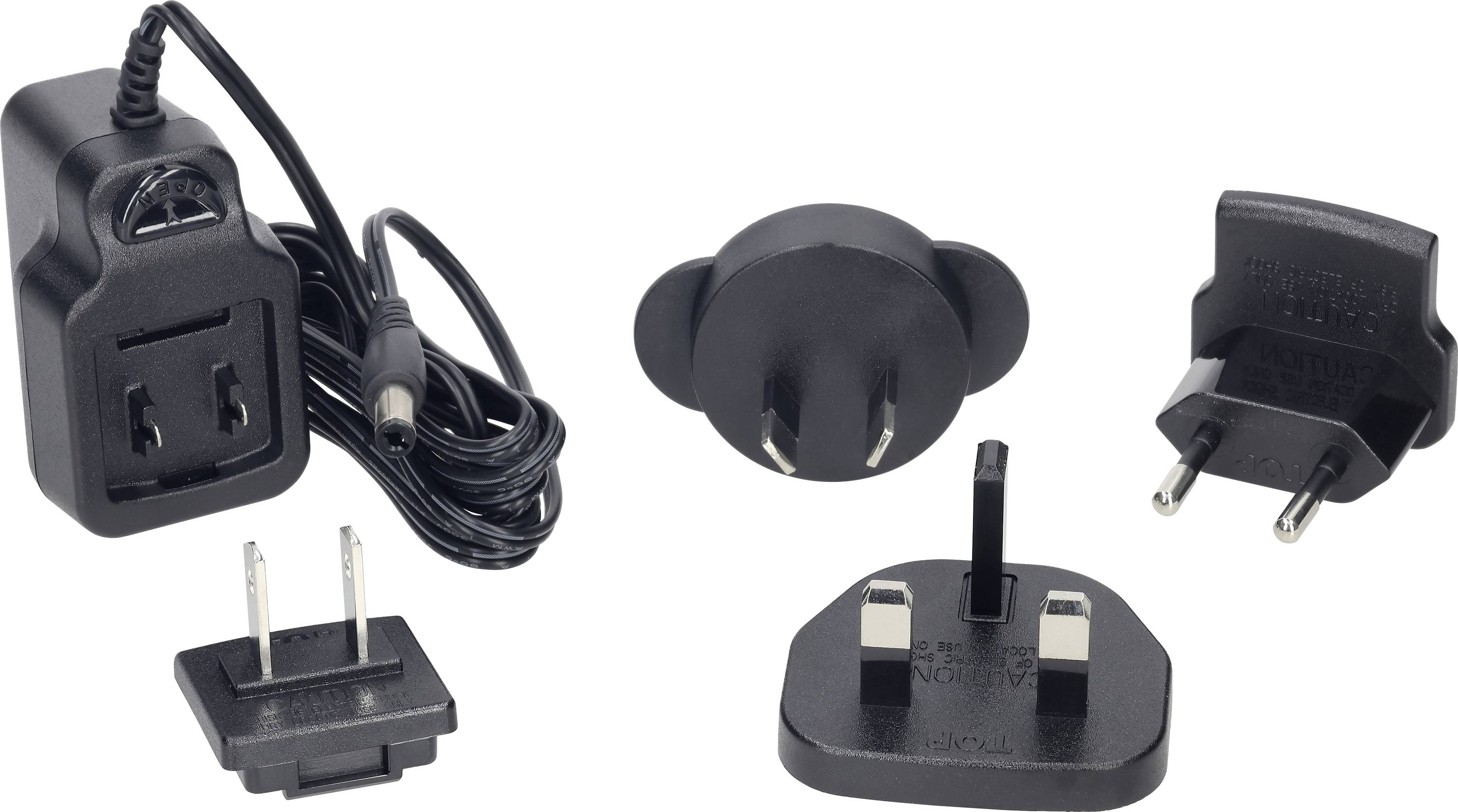 Crni mrežni adapter s tri različita adaptera za utičnice: EU, UK i US utikač. Adapter za međunarodnu opskrbu strujom.