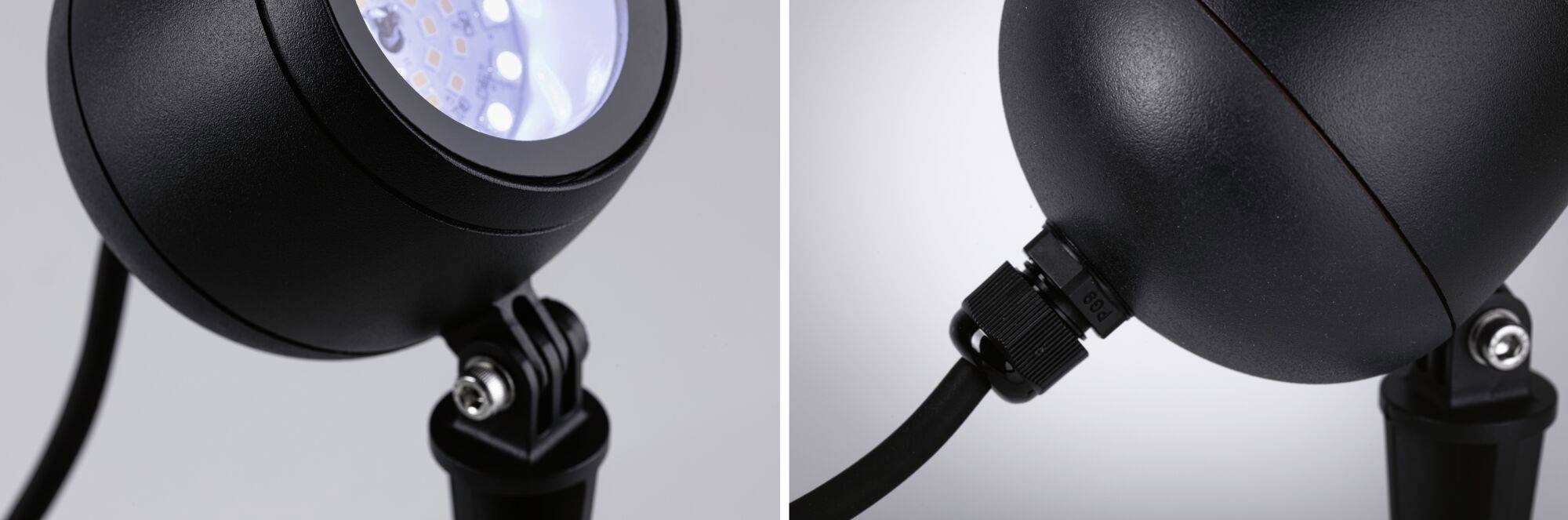 Bliski kadar okruglog, crnog LED-reflektora s podesivim postoljem i priključkom za kabel. Idealan za precizno osvjetljenje.