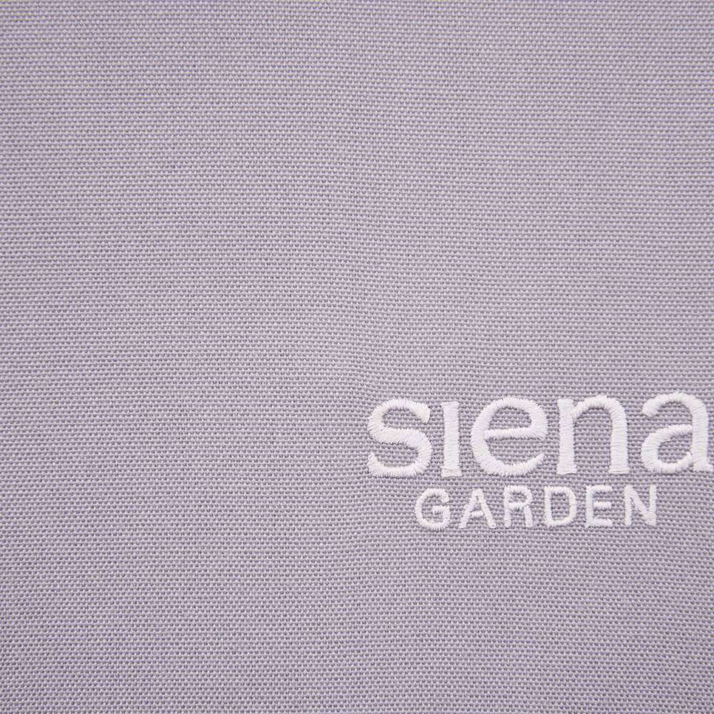 Slika prikazuje natpis 'Siena Garden' na sivoj tekstilnoj pozadini.