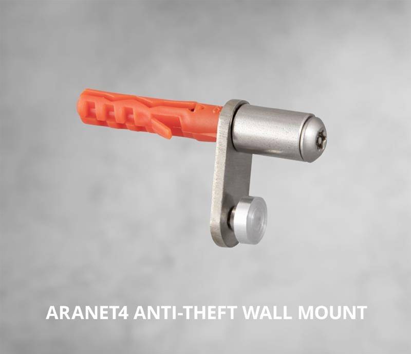 Aranet4 Anti-Theft zidni nosač pred sivom pozadinom, prikazuje srebrni zidni nosač s crvenom tipkom.
