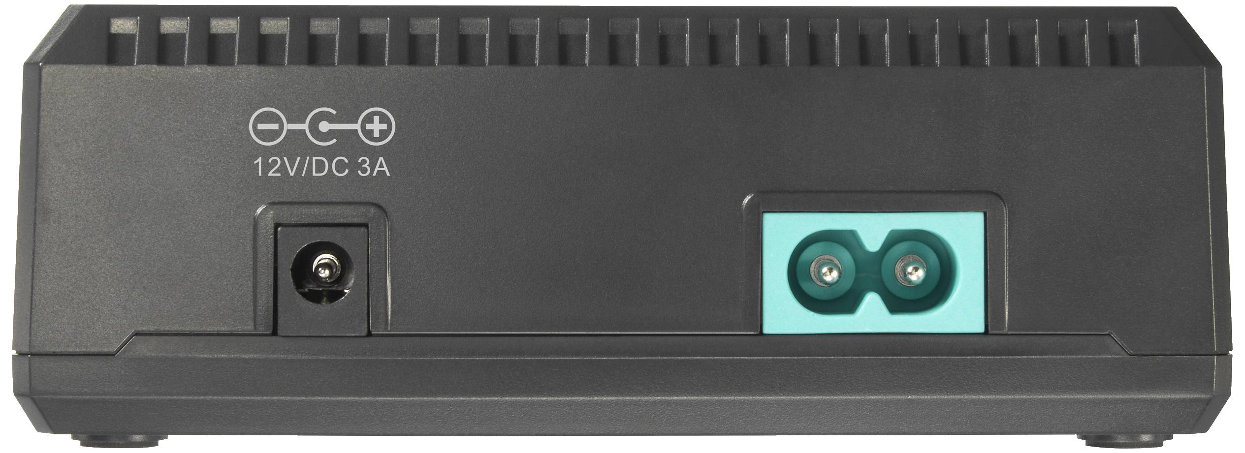 Stražnja strana elektroničkog uređaja s 12V/DC 3A mrežnim priključkom i zelenim dvopolnim priključkom.