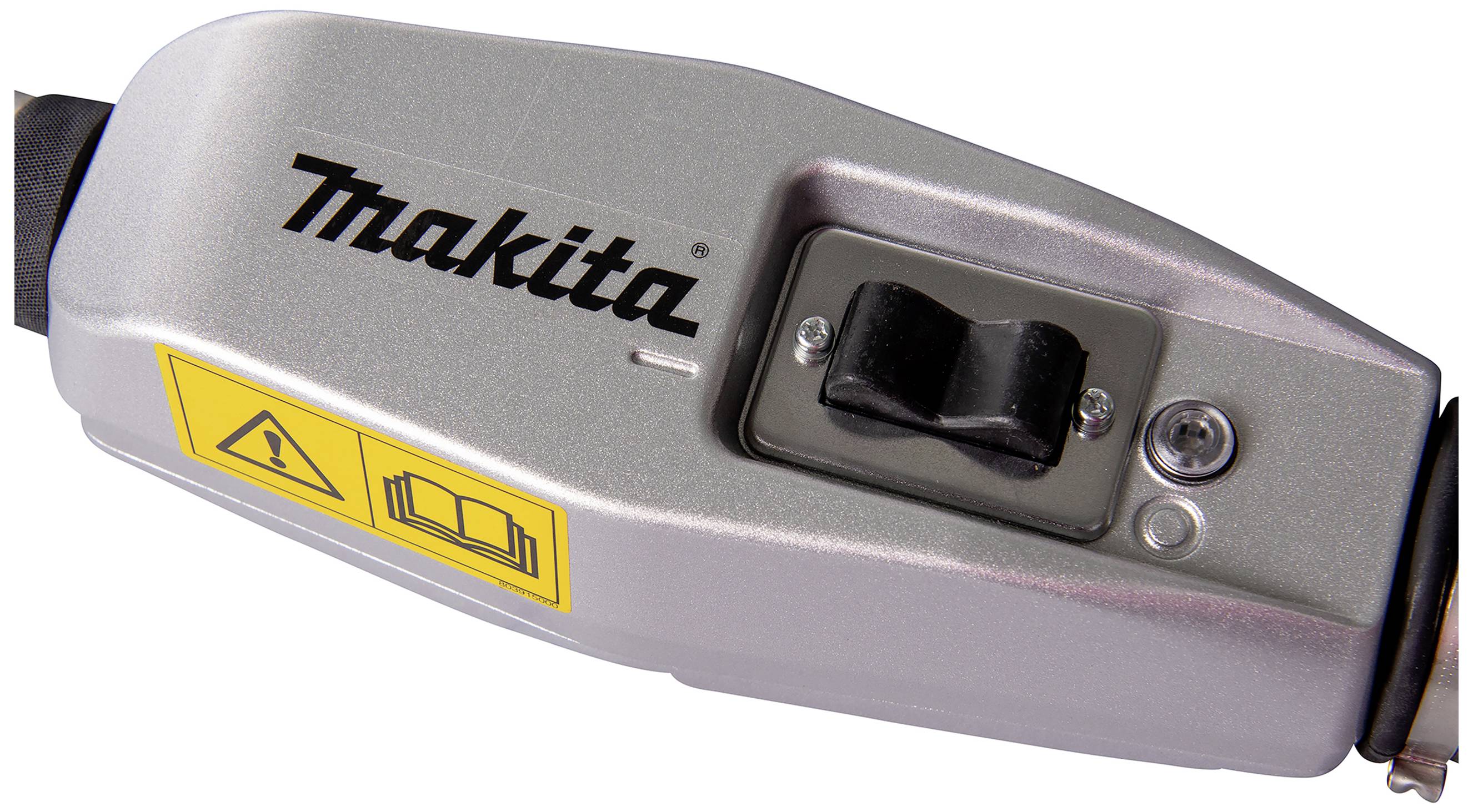 Srebrni prekidač na uređaju s logotipom 'Makita', simbolom upozorenja i ikonom baterije.