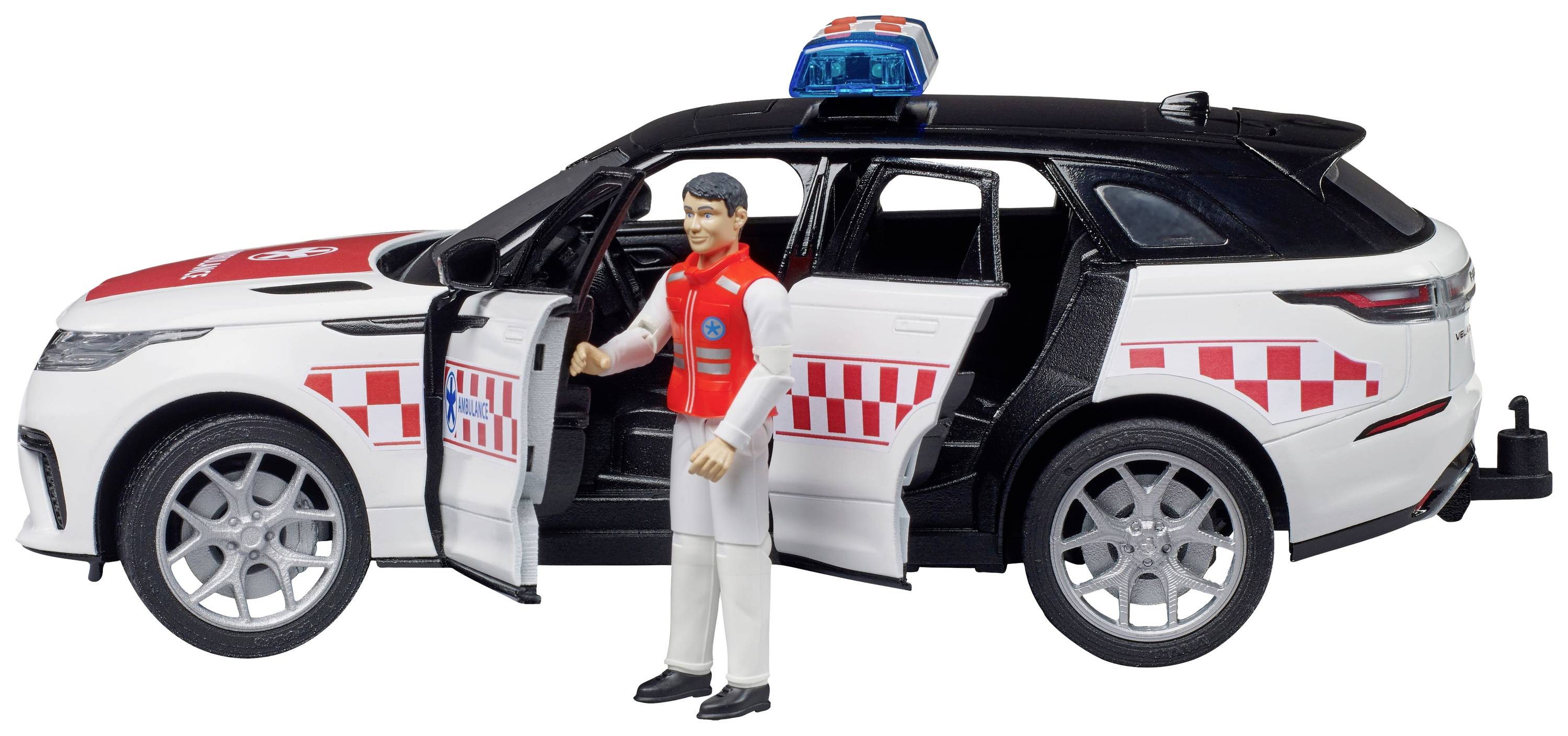 Igračka policijski automobil s otvorenim vratima. Figura u crvenoj jakni stoji pored automobila. Auto ima plavo svjetlo na krovu.