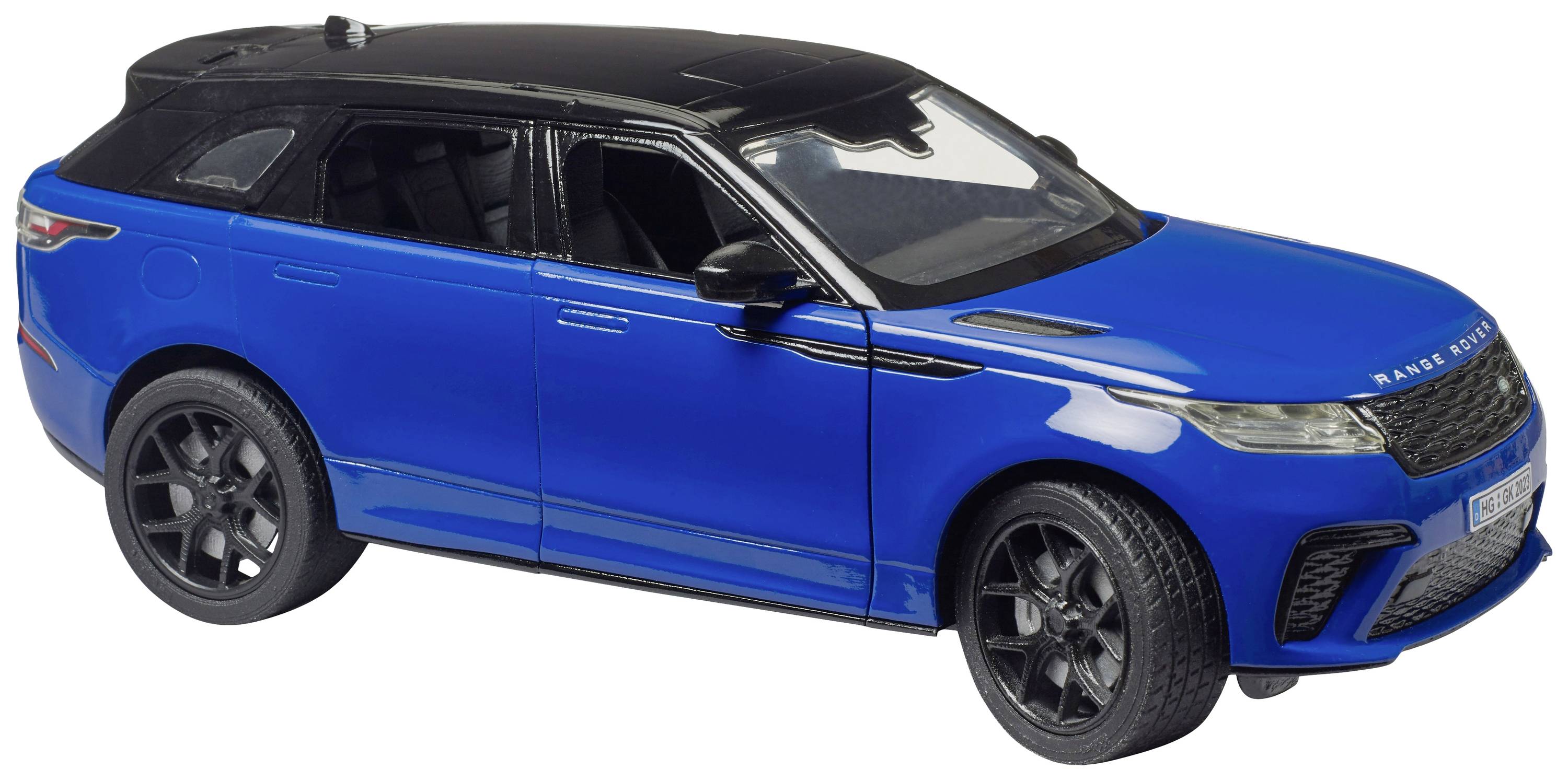 Plavi automobilski model sa strane, s crnim naplatcima i krovom, na bijeloj pozadini.