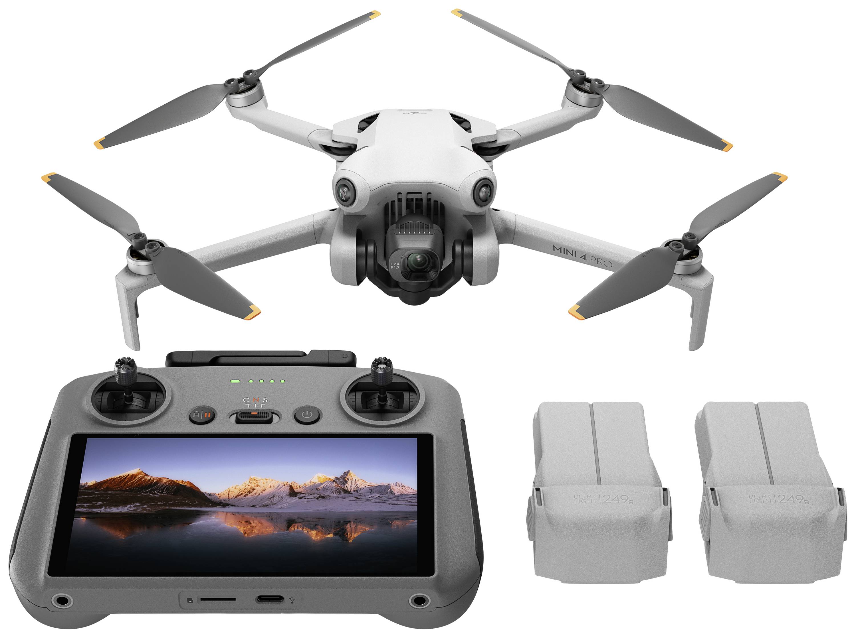 Dron s četiri propelera, uključujući upravljačku jedinicu s ekranom i dvije baterije.
