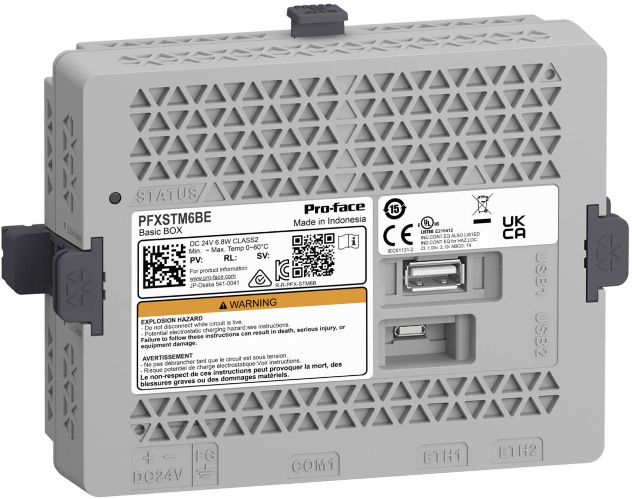 Sivi elektronički uređaj s natpisom 'Pro-face' i modelnim brojem 'PFXSTM6BE'. Sadrži dva USB priključka i sigurnosne upozorenja na engleskom jeziku.