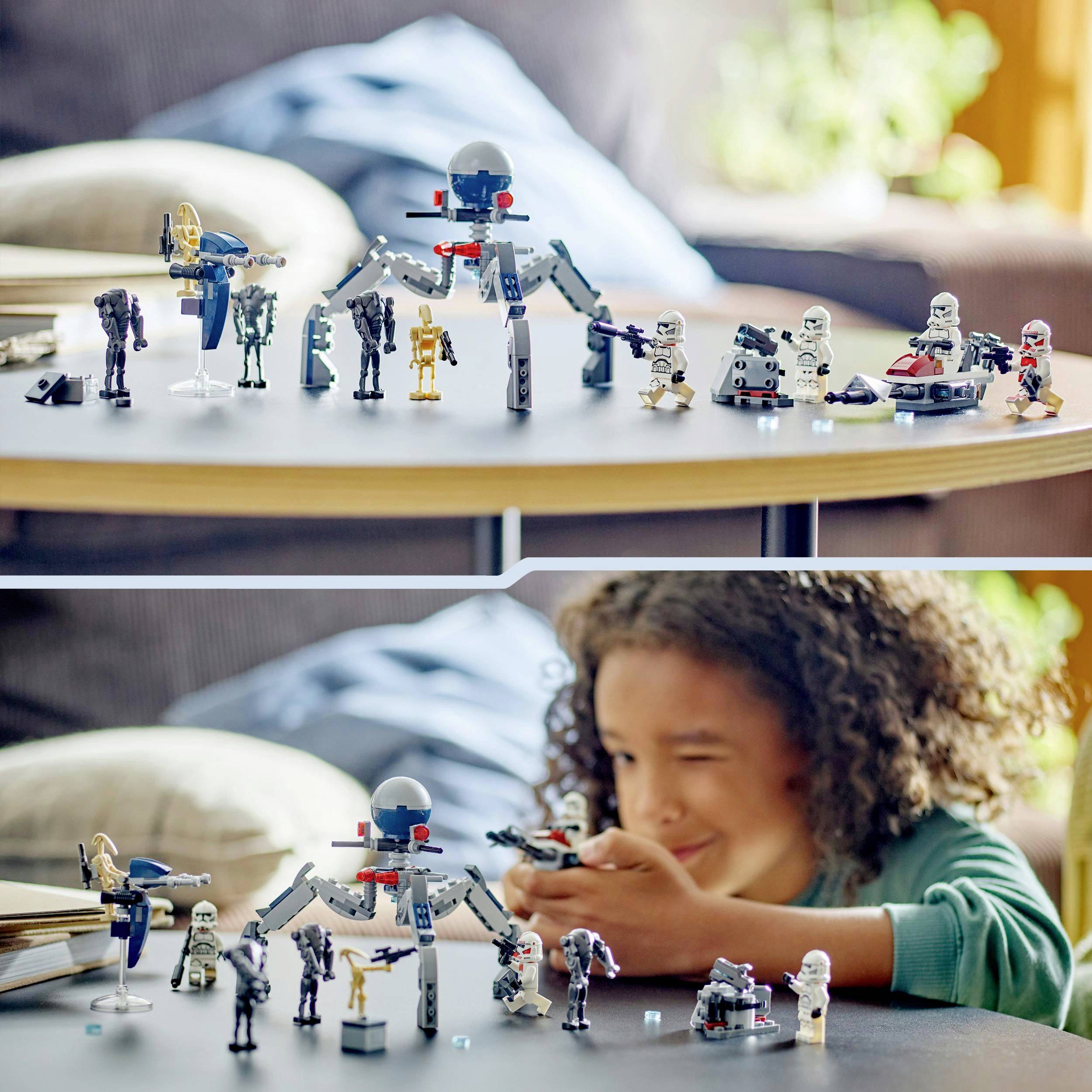 Dijete se igra na stolu s nekoliko modelnih robota i figura posloženih u red.