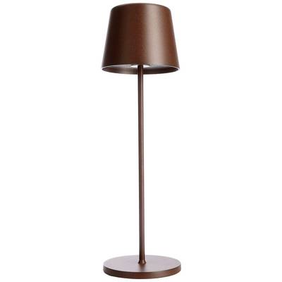 Smeđa podna lampa jednostavnog, modernog dizajna. Cilindrični sjenilo i vitka postolje sve do okruglog podnožja.