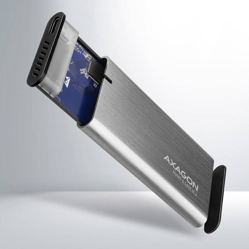 Kućišta za M.2 SSD marke 'AXAGON' napravljena od metala, djelomično otvorena s vidljivom elektroničkom podlogom.