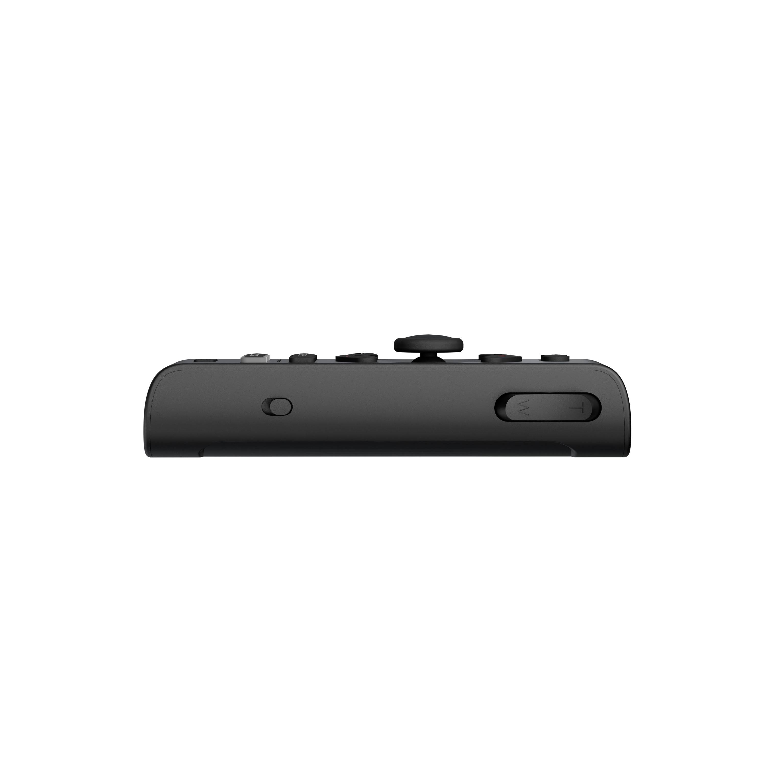 Crni Joy-Con kontroler, pogledan odozgo, prikazuje raspored tipki i dizajn.