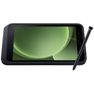 Crni tablet s zelenim zaslonom i olovkom za pisanje pored njega.