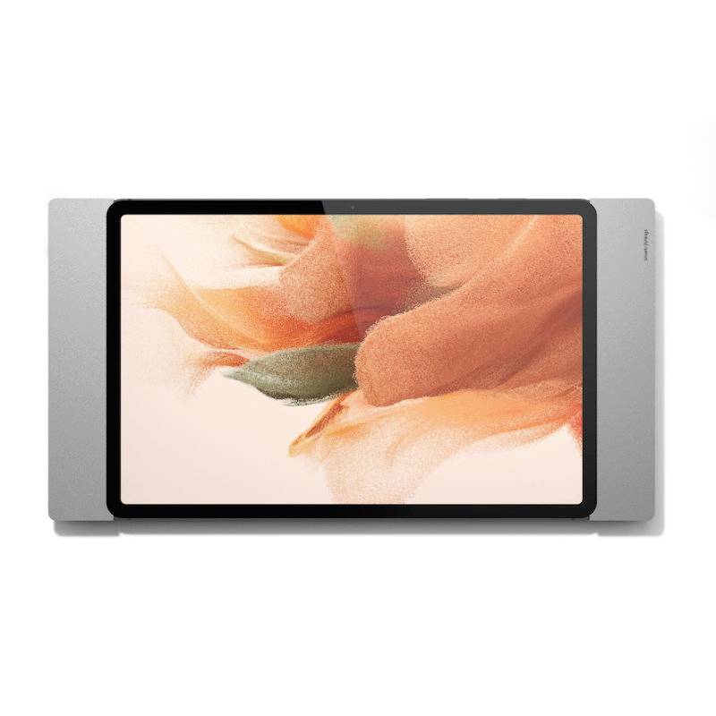 Tablet s sivim okvirom na kojem se nalazi apstraktna grafika narančaste boje.