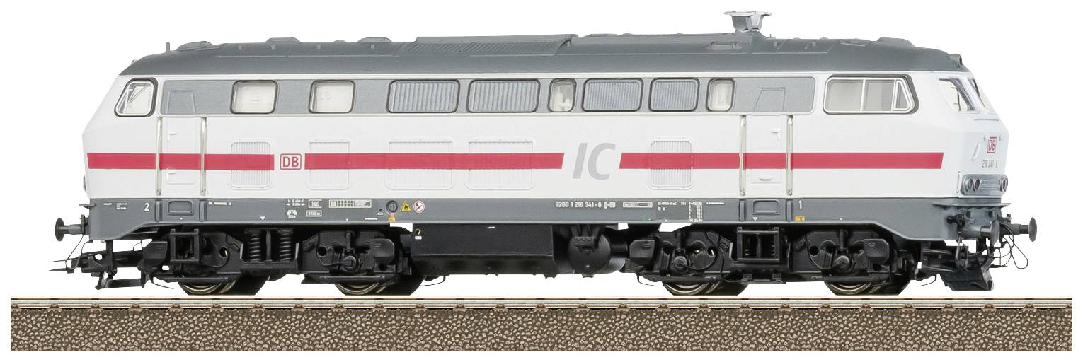 Siva i bijela lokomotiva Deutsche Bahn-a s crvenom trakom stoji na tračnicama.