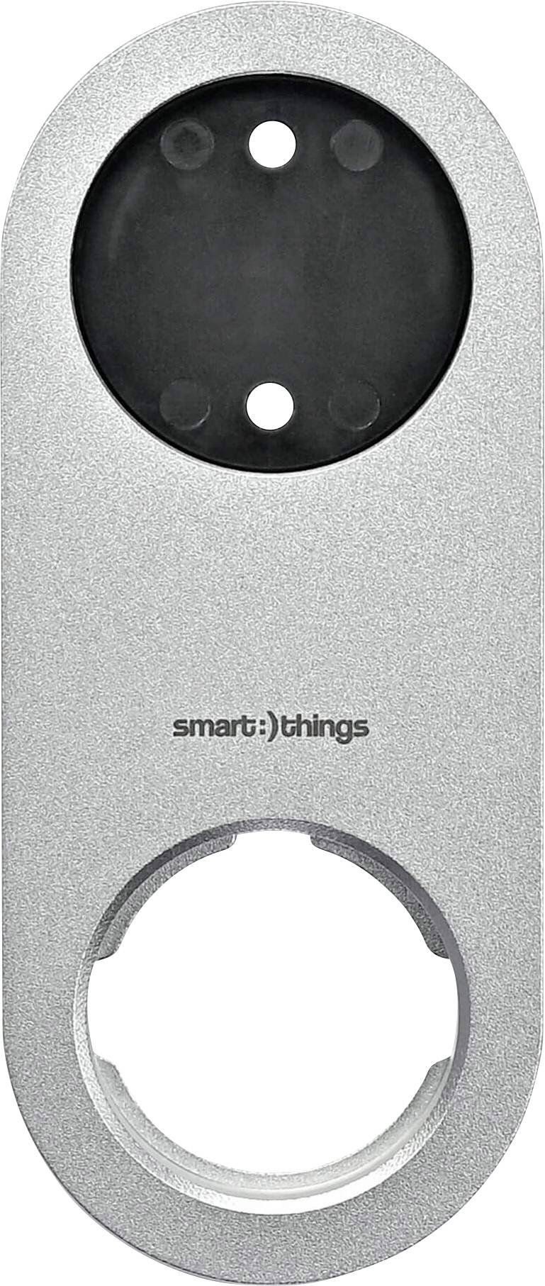 Srebrni, ovalni adapter za utičnicu s dvije okrugle otvore i natpisom 'smart:)things'.